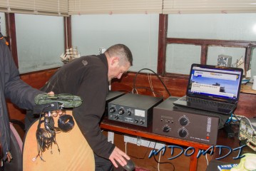Ross Bane (GM1KNP) putting the finishing touches to the station at Scarlett Point, Isle of Man