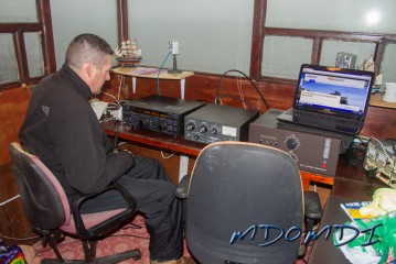 Ross Bane (GM1KNP) listerning to the bands at Scarlett Point, Isle of Man