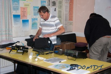 Claus (DO9BC) unpacking equipment ready for use.