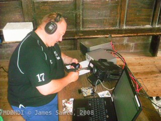 Dave Cain (2D0YLX) working the radio