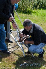 Bernd (DH1SBB) attaching the Spiderbeam base to the stub mast with help from Guenther (DG1SBU)
