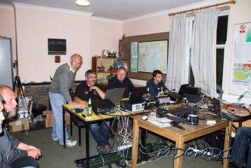 The whole DXpedition team enjoying a night on the radio