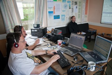 Claus (DO9BC) in the hot seat with Rainer (DG5SBK) logging, and that's Achim (DG3SAD) having a rest on the comfy seats