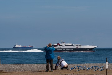Walter (DJ4AK) and the one with the 'Builders Bum' is Markus (DO5MZ) taking photos of the Mannanin as she goes around the Point of Ayre
