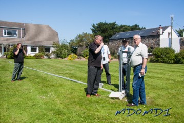 Bob Barden (MD0CCE) showing the guys from the OV P08 DXpedition to the Isle of Man the Titanex 160m Vertical antenna