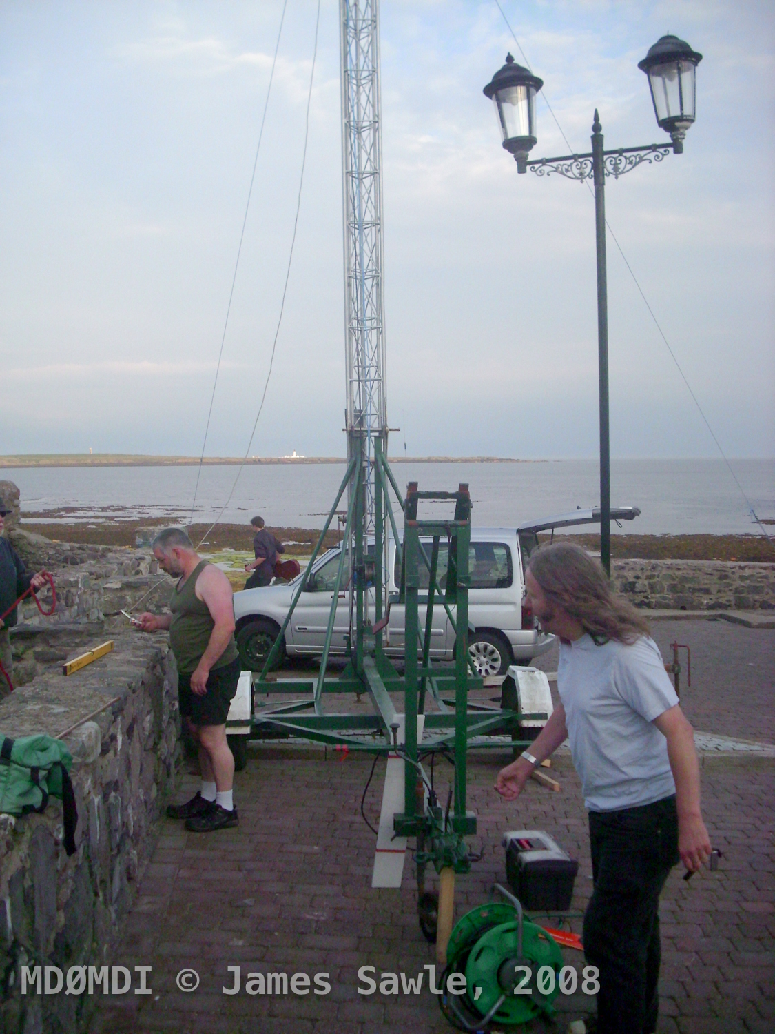 Steve (GD7DUZ) and Stuart (GD0OUD) putting the finishing touches to the tower and making sure that everything is safe, as she would be left up and unattended over night for the weekends event.