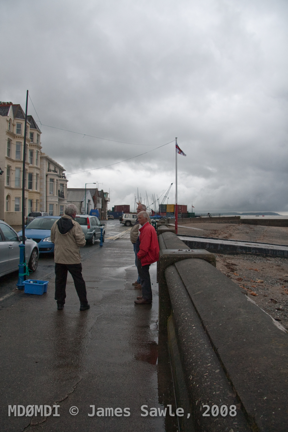 Bob (MD0CCE) and John (GD4RAG) and the hired help chatting about a job well done on a very damp day in Ramsey.