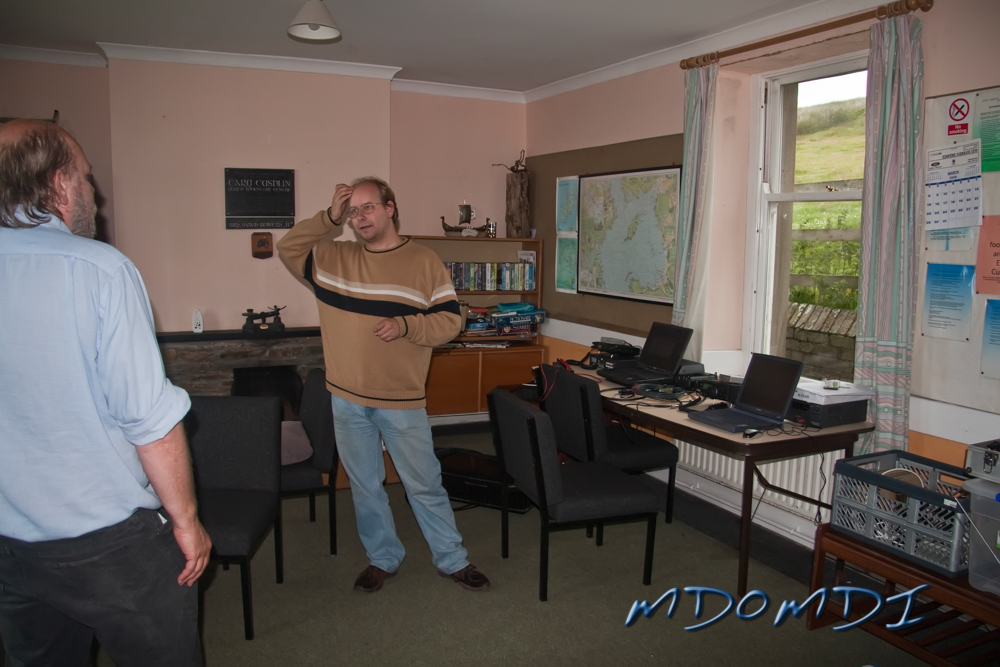 Peter Herring (DL1SPH) chatting with Markus Wagner (DO5MZ) about setting up the shack.