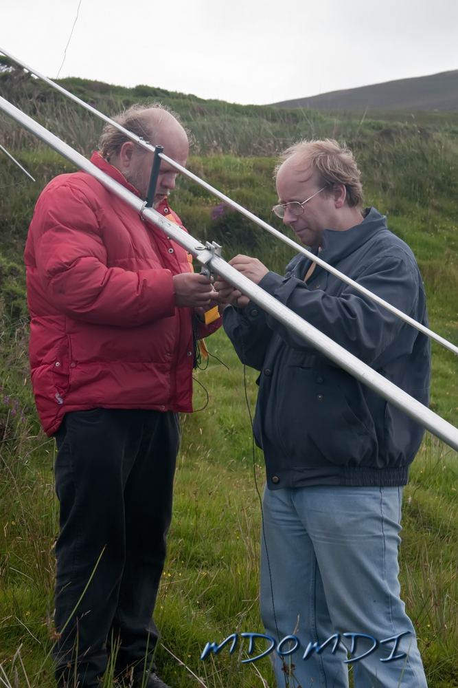 Peter Herring (DL1SPH) and Markus Wagner (DO5MZ) finishing off the guys wires for the GAP Voyager antenna