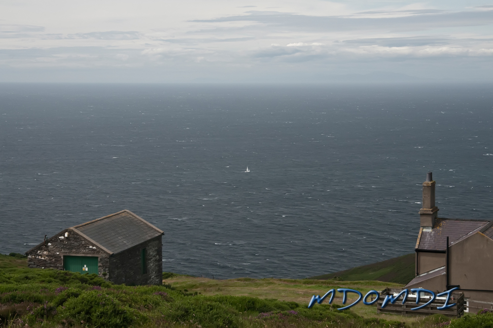 A small yacht braving the Irish sea in the force 3-4 weather of the coast of the Isle of Man