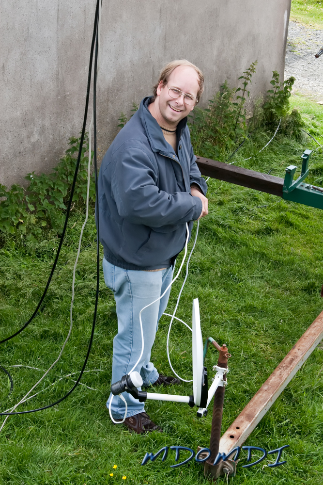 Markus Wagner (DO5MZ) putting the finishing touches to the Satellite TV dish.