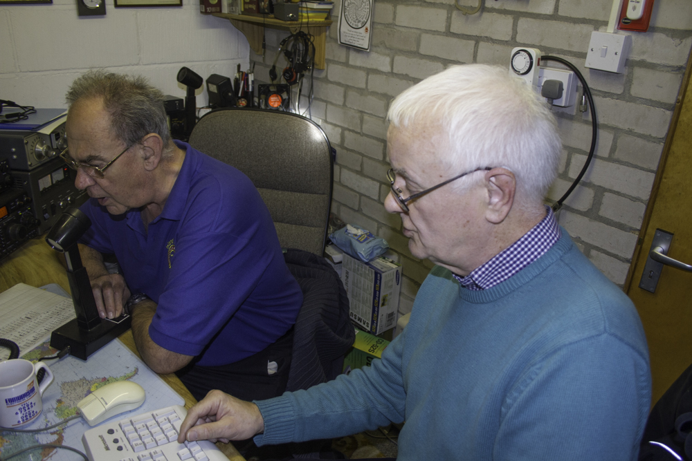 Mike Jones (GD4WBY) working a pileup whilst John (GD0NFN) helps with the logging.