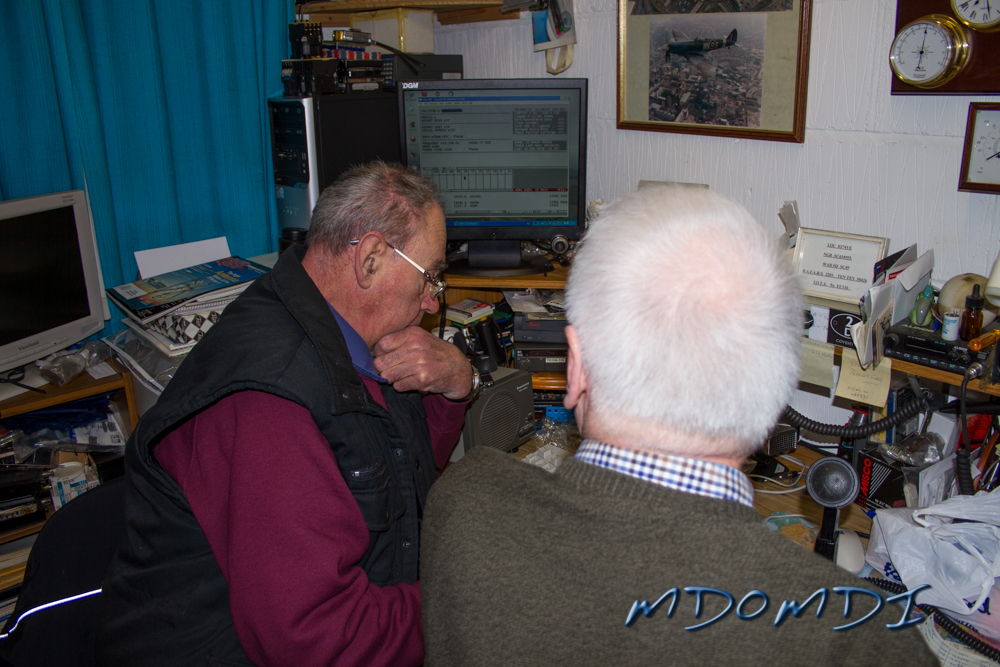 Mike Jones (GD4WBY) adding contacts to the logbook for John Butler (GD0NFN) who is manning the radio.