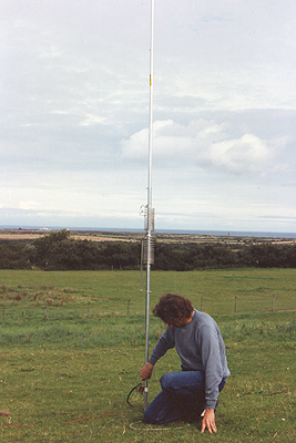 Mike GD4BEG inspects the HF2V vertical for 40m and 80m. Sea is down-hill to the north.