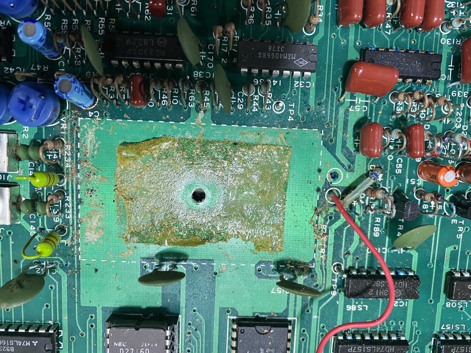 The Yuk left behind on the PCB once the Battery Holder was removed.