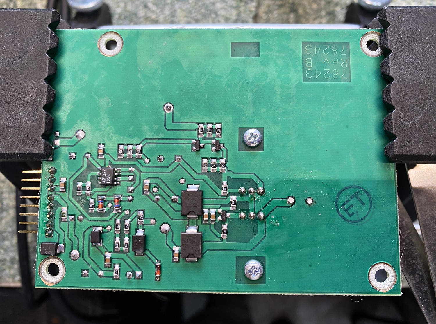 First Capacitor Soldered and legs cut off.