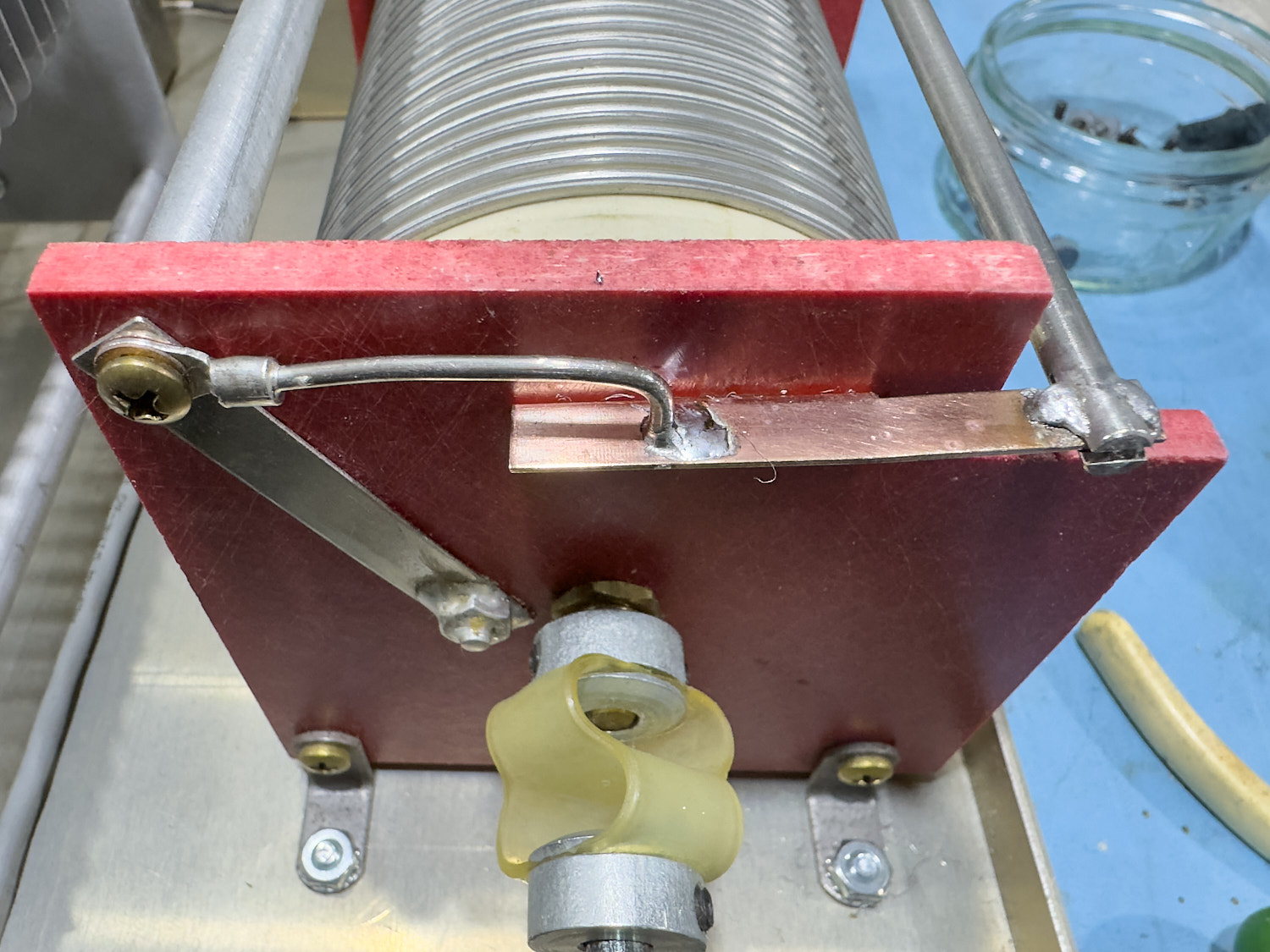 Just add just enough solder to hold the bar in place.