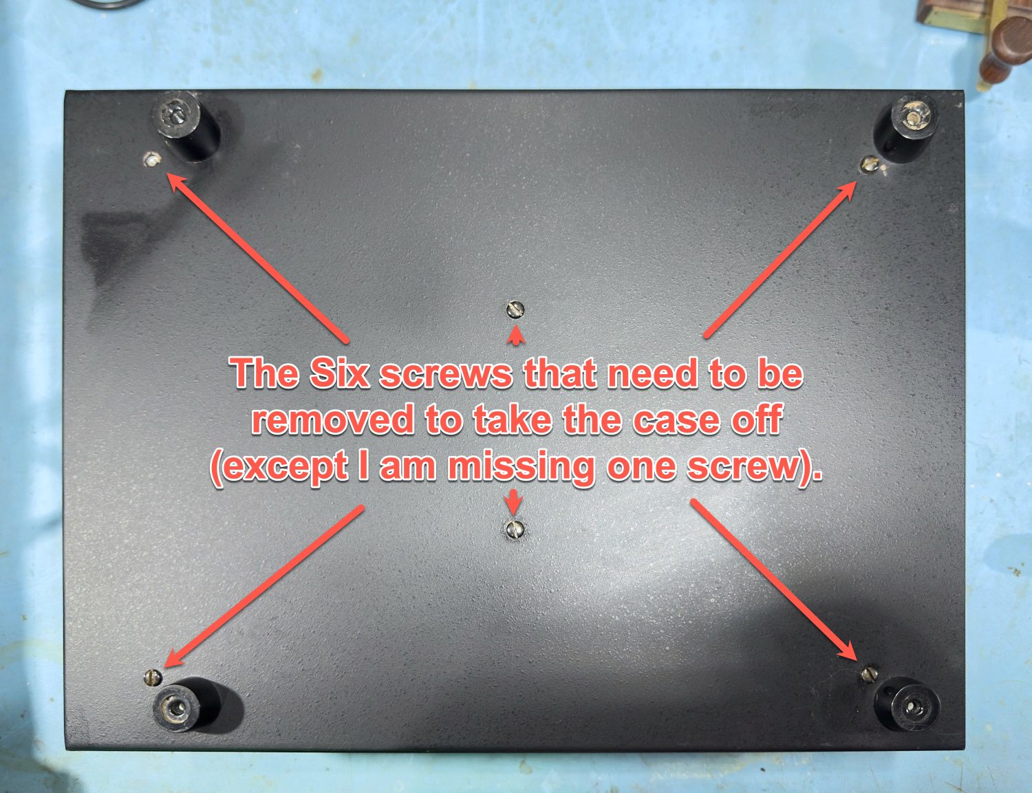 There are 6 screws that you need to remove from the underside to remove the case.