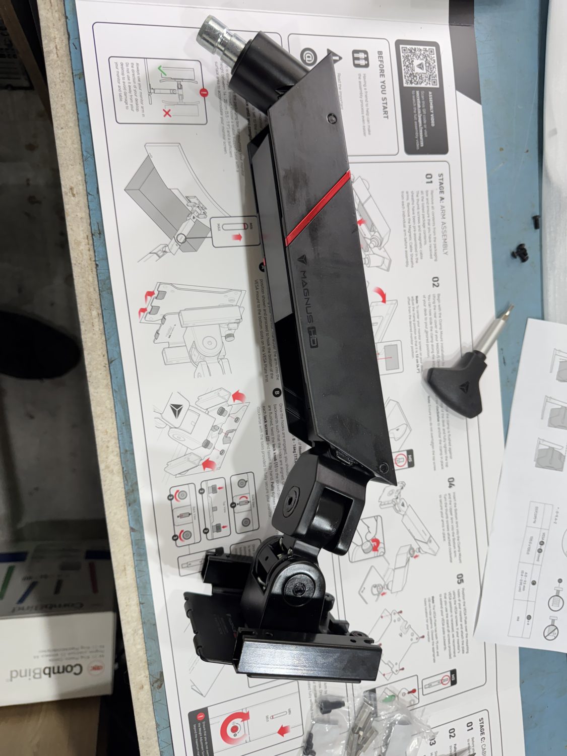 The top section of the Arm is removed as this needs to be fitted onto the monitor first.